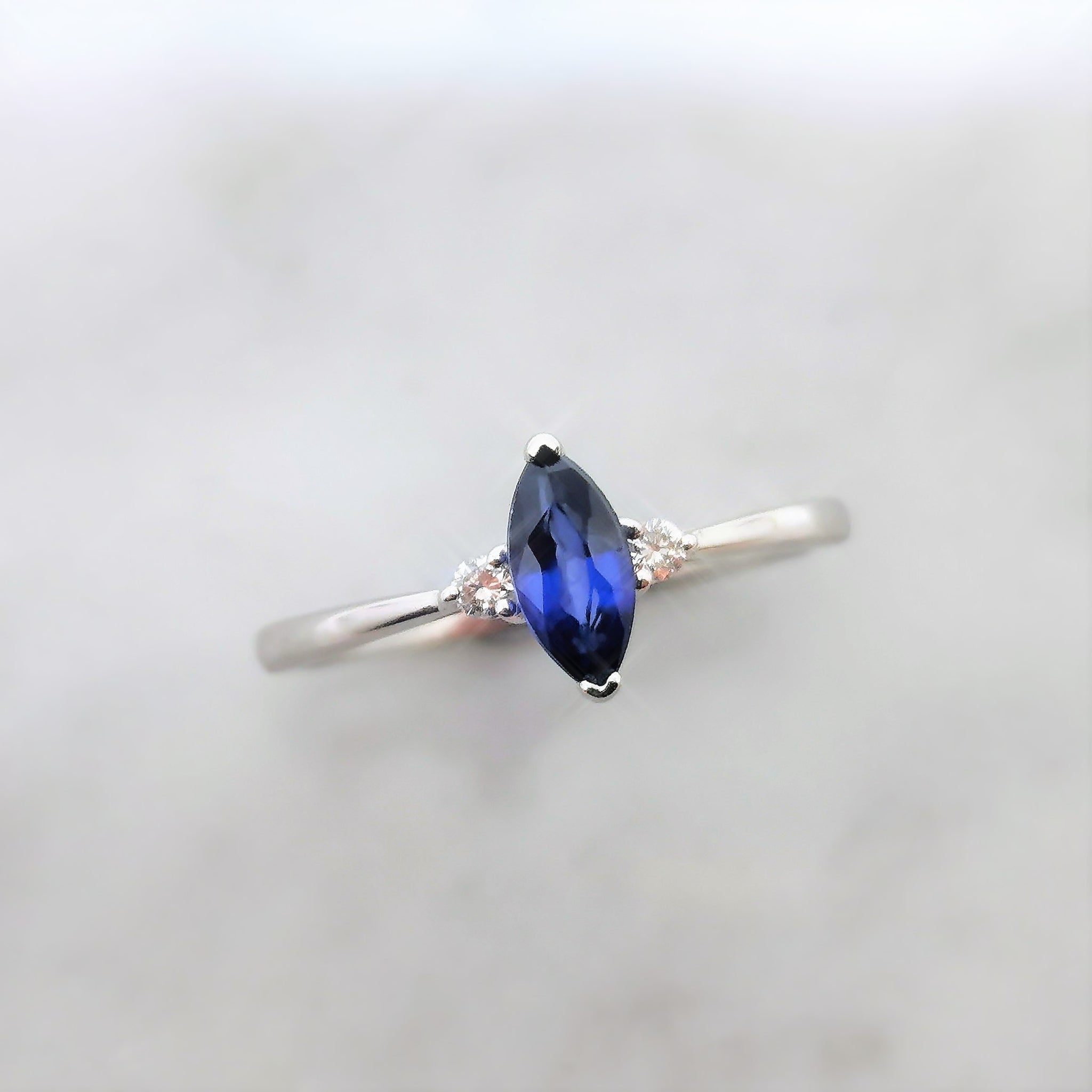 18k White Gold 0.50ct Marquise Blue Sapphire and Diamond Ring